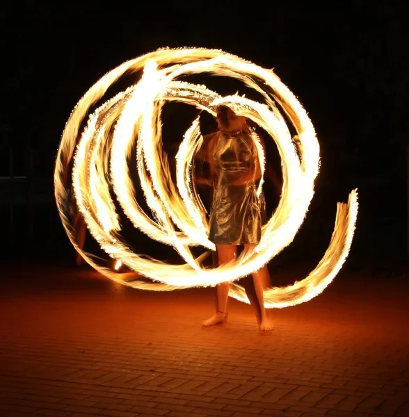 Fire performance during an island evening experience