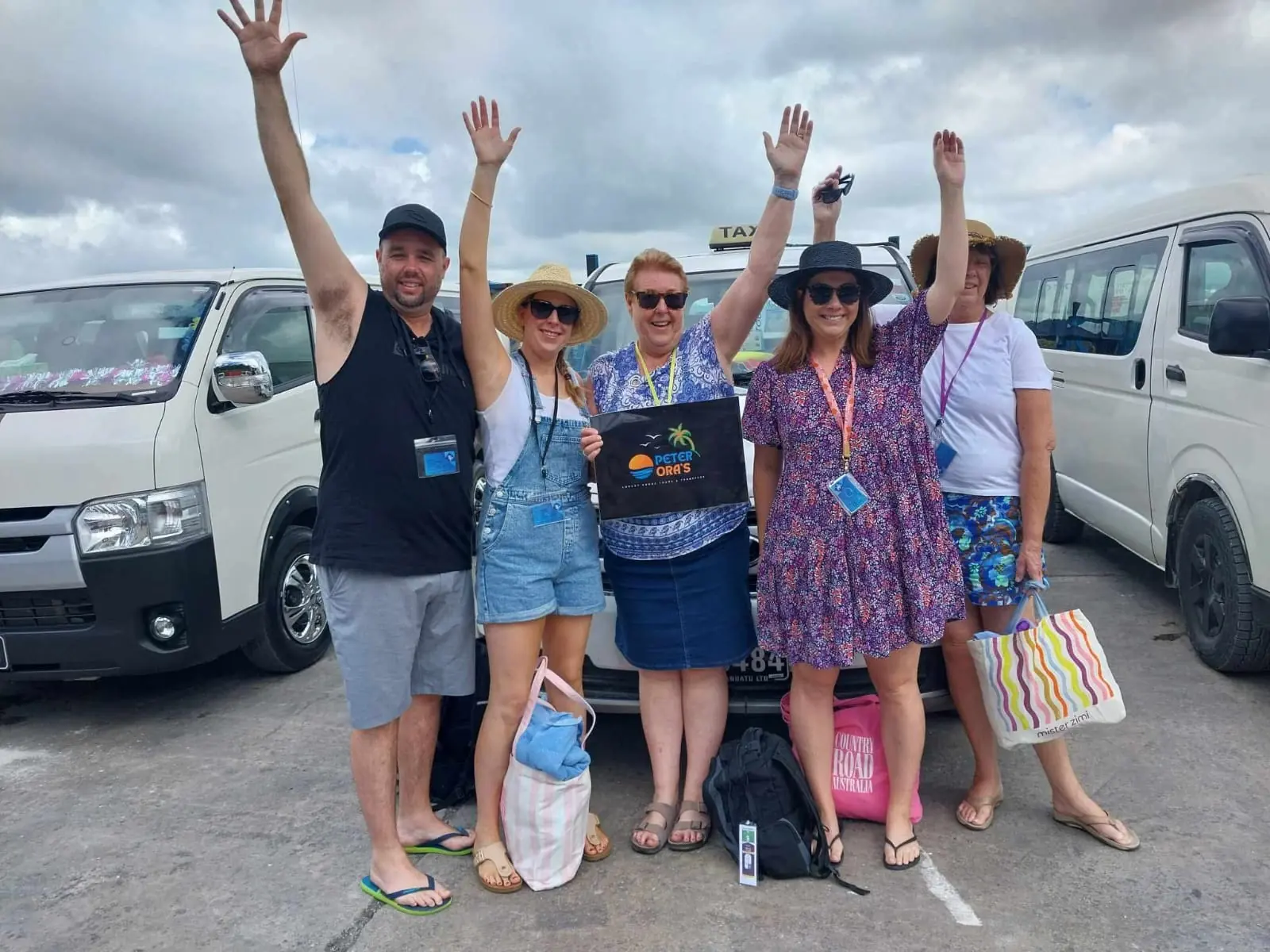 Guests with Peter Ora's tour vehicle in Port Vila