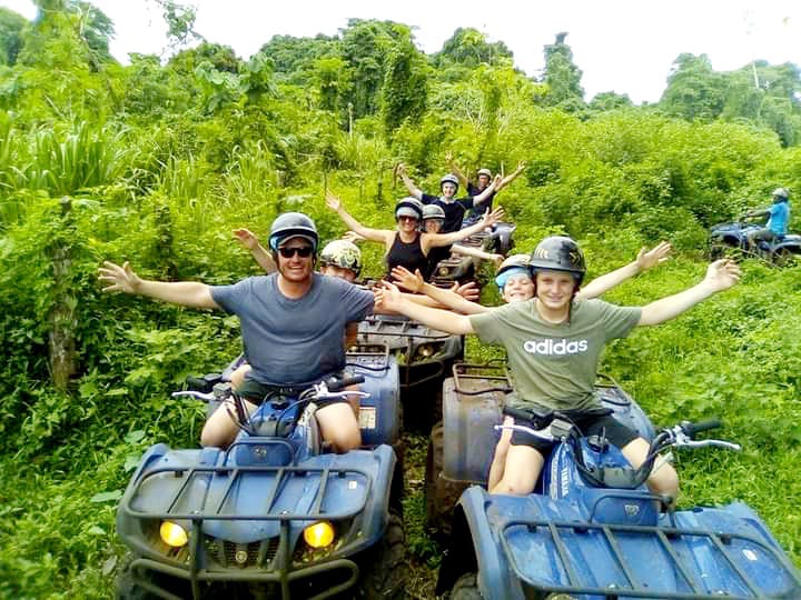 Guests riding quad bikes
